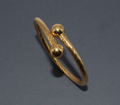 BRACELET JONC esclave en or jaune 18K (750/°°)...