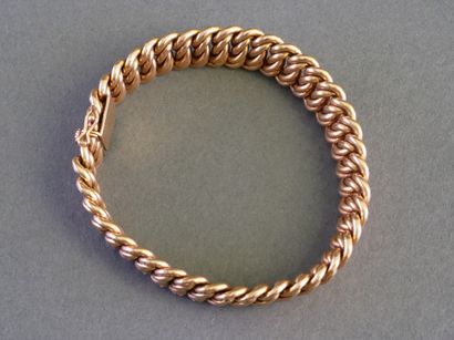 18k yellow gold (750/°°) bracelet with an...