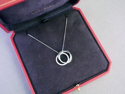 CARTIER
“Trinity” pendant in 18k white gold...