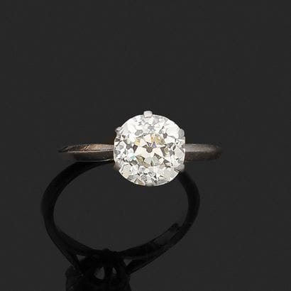 SOLITAIRE RING in platinum set with a natural...