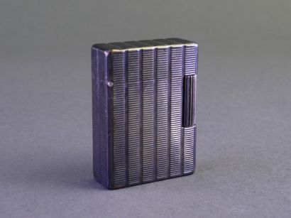 DUPONT
Silver-colored metal lighter with...