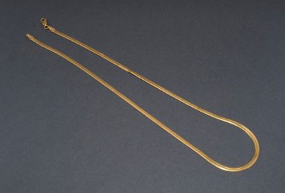 COLLIER en or jaune 18K (750/°°) maille miroir,...