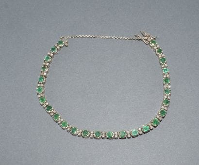 BRACELET RIVIERE en or blanc 18k (750/°°)...