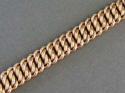 18k yellow gold (750/°°) bracelet with an...