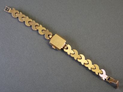 TISSOT
LADIES' WATCH in 18k yellow gold (750/°°),...