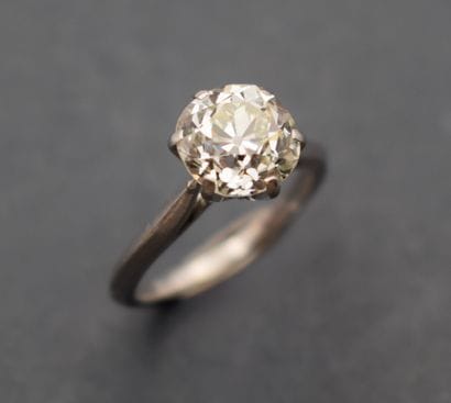 SOLITAIRE RING in platinum set with a natural...