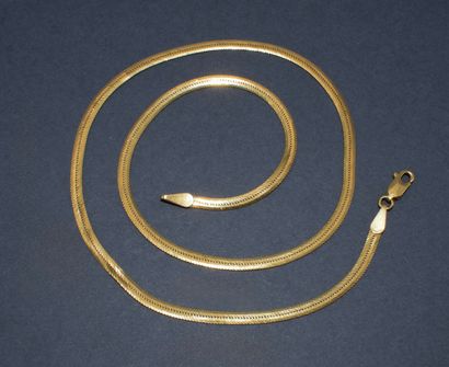 COLLIER en or jaune 18K (750/°°) maille miroir,...