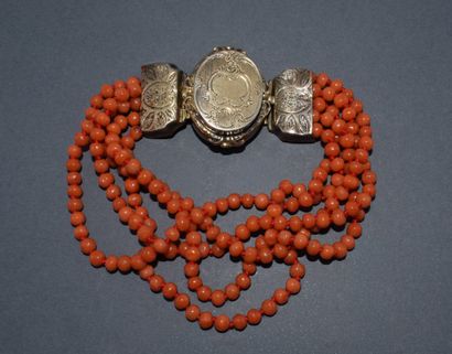 BRACELET en argent 925/°° multibrins de corail...
