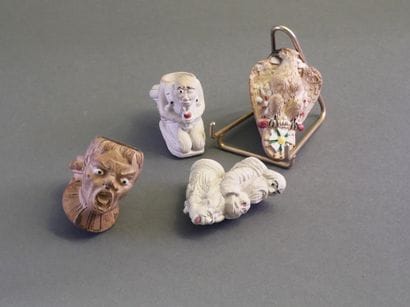 GAMBIER.
Set of 4 enameled heads:
-without...