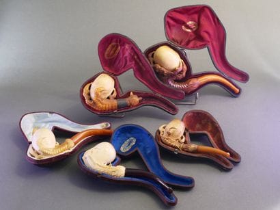 Set of 5 carved meerschaum pipes depicting...