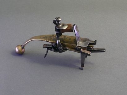 Iron flint table lighter with brass handle...