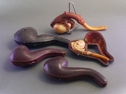 Set of 5 carved meerschaum pipes depicting...