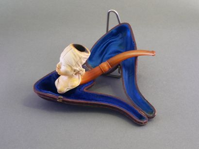 Beautiful carved meerschaum pipe depicting...