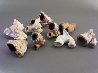 GAMBIER.
Lot of 8 large enameled heads:
-without...