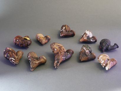 GAMBIER.
Lot of 10 enameled heads with very...