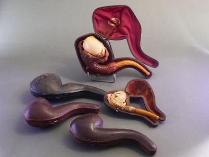Set of 5 carved meerschaum pipes depicting...
