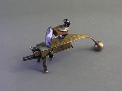 Iron flint table lighter with brass handle...