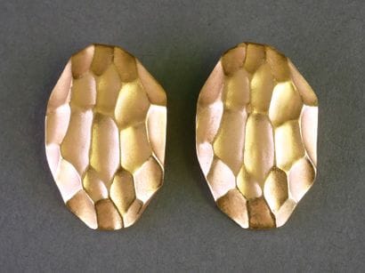 YSL
Pair of gold-tone metal clip-on earrings,...