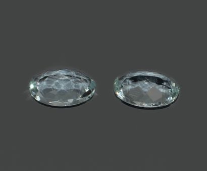 A pair of oval aquamarines. 
Dimensions:...