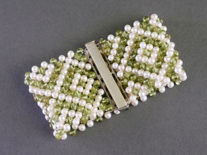 Ribbon bracelet woven from freshwater pearls...