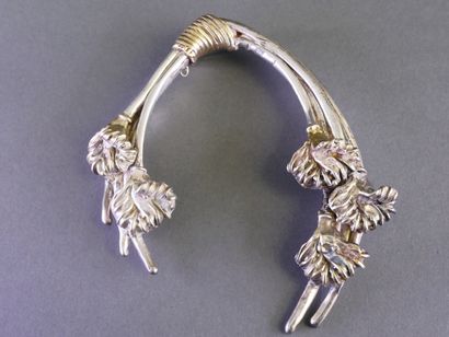 A very large silver and gold-plated silver...
