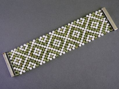 Ribbon bracelet woven from freshwater pearls...