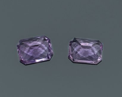 A pair of rectangular amethysts with beveled...