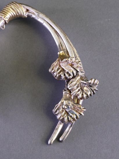 A very large silver and gold-plated silver...