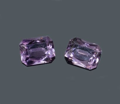 A pair of rectangular amethysts with beveled...