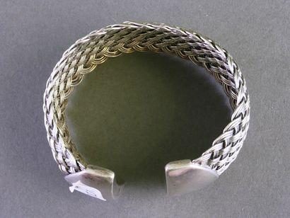 Open, rigid silver bracelet (min. 800/°°)...
