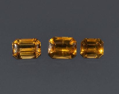 Set of 3 rectangular, faceted Cognac citrines....