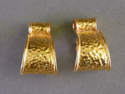 YSL
Pair of gold-tone metal clip-on earrings...