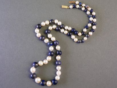 Necklace featuring pearls and cascading blue...