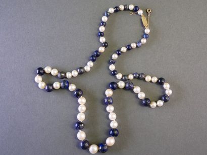 Necklace featuring pearls and cascading blue...