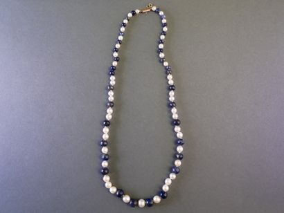 Necklace featuring pearls and cascading blue...