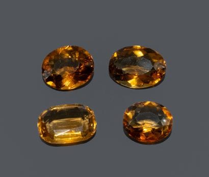 Set of 4 Cognac-colored citrines, antique-cut....
