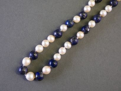 Necklace featuring pearls and cascading blue...