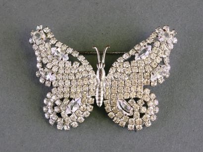 VINTAGE
Metal butterfly brooch set with clear...