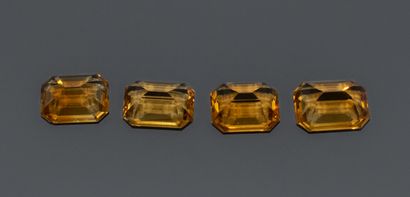 Set of 4 rectangular, faceted Cognac citrines....