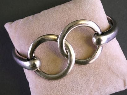 Rigid, hinged silver bracelet (min. 800/°°),...