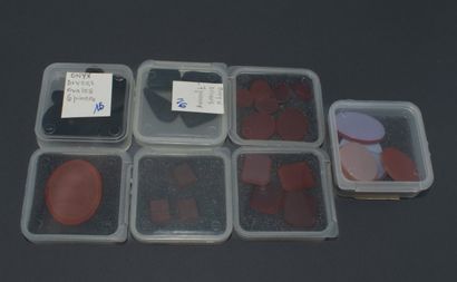 Set of 7 boxes of onyx and carnelian plates...
