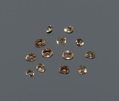 Set of 13 predominantly yellow imperial topazes....