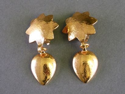YSL
Pair of gold-tone metal clip-on earrings...
