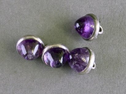 Fragments of cufflinks or buttons set with...