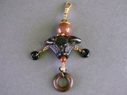 Large costume jewelry pendant made of gold-plated...