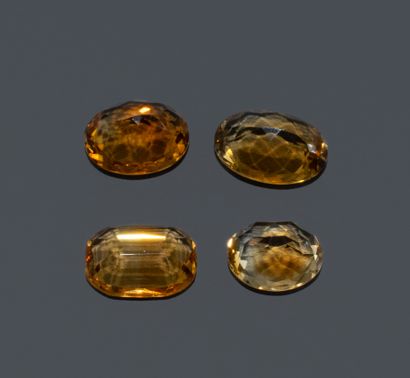 Set of 4 Cognac-colored citrines, antique-cut....