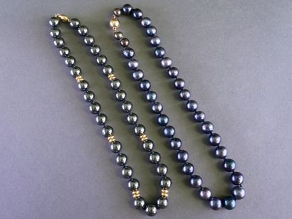 Set of two choker necklaces. 
One features...