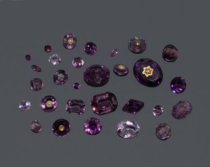 Set of purple stones. 
Total weight: 30.63...