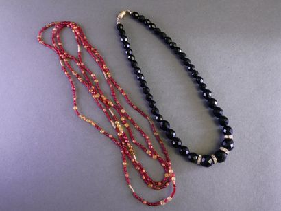A large collection of costume jewelry, including...