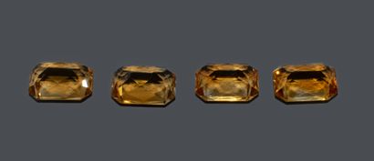 Set of 4 rectangular, faceted Cognac citrines....
